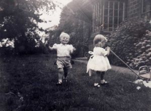 Mike Bitton Grandson Of George Bitton Farm Bailiff 1931 - 1954 Playing In The Garden Of Holme Farm With Storeman Murphy's Daughter circa 1954